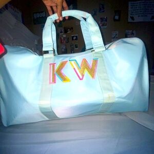 Light blue duffel bag double handle